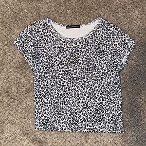 White and blue cheetah print crop top! One size, but would best fit an XS or S.